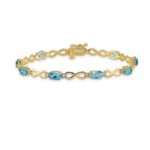 10k Blue Topaz and Diamond Infinity Bracelet - Image 3