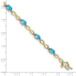 10k Blue Topaz and Diamond Infinity Bracelet - Image 4